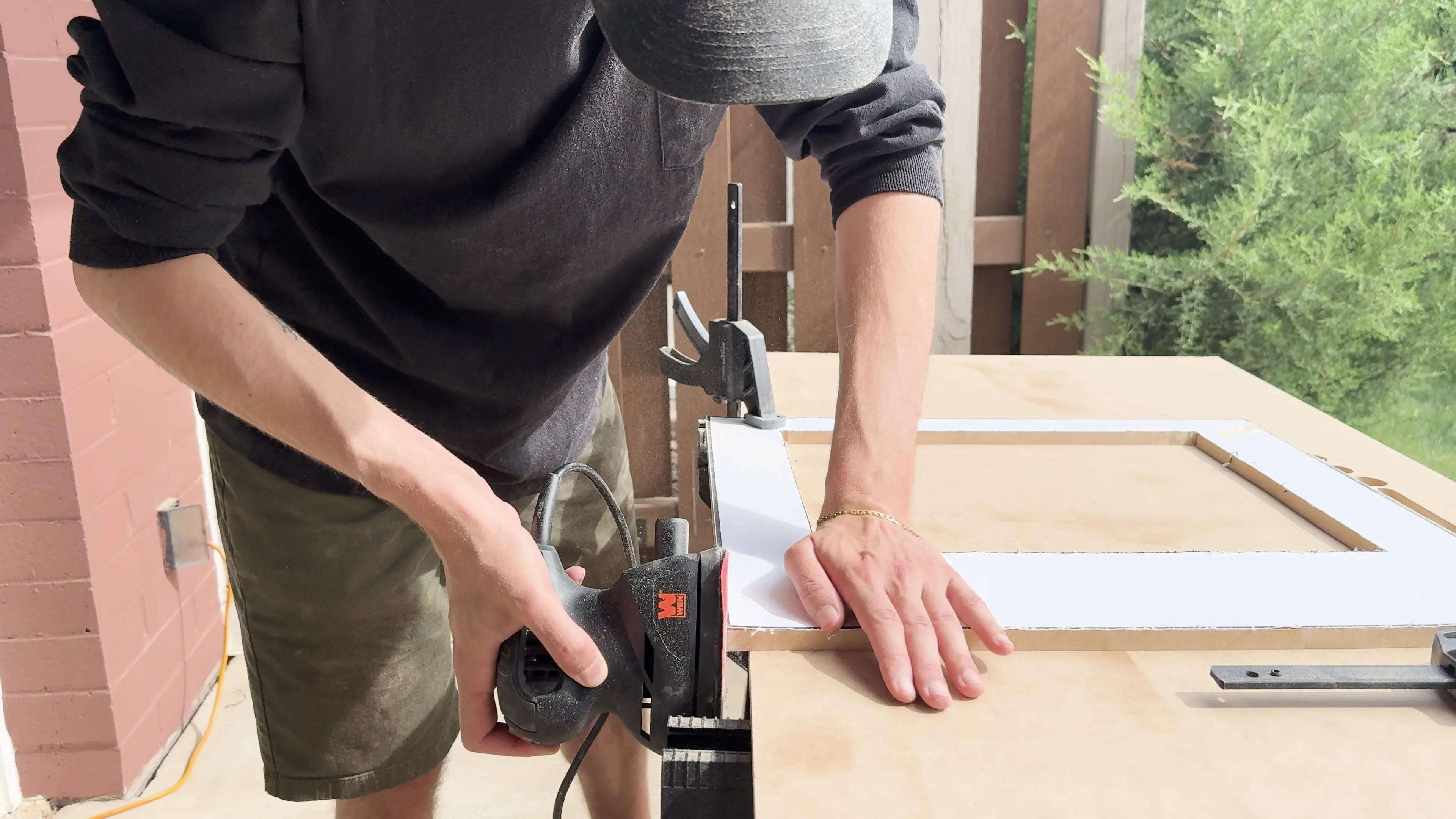 Sanding the edges to the template dimension.
