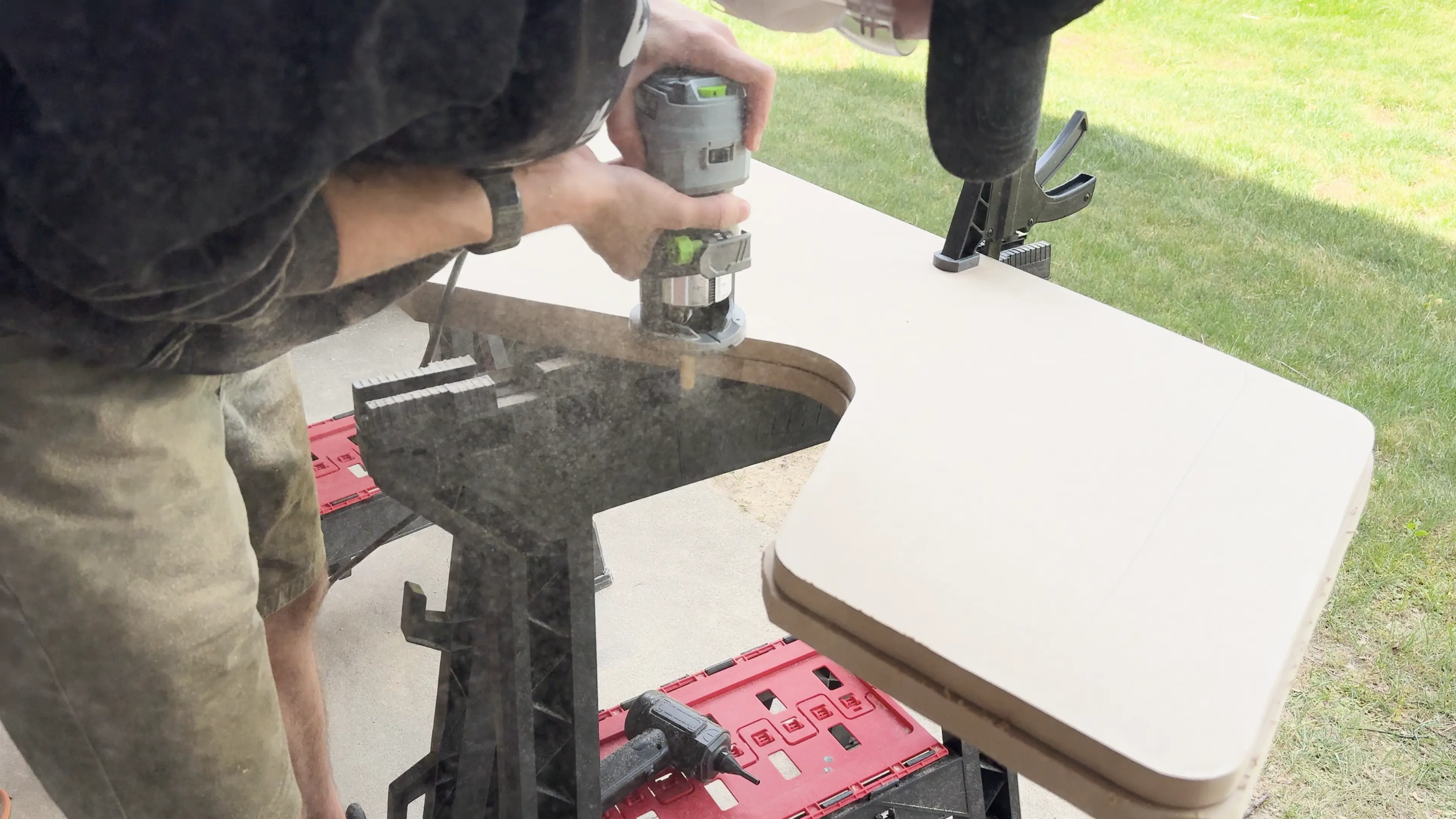 Using the flush trim bit to make a perfect duplicate of the good side panel.