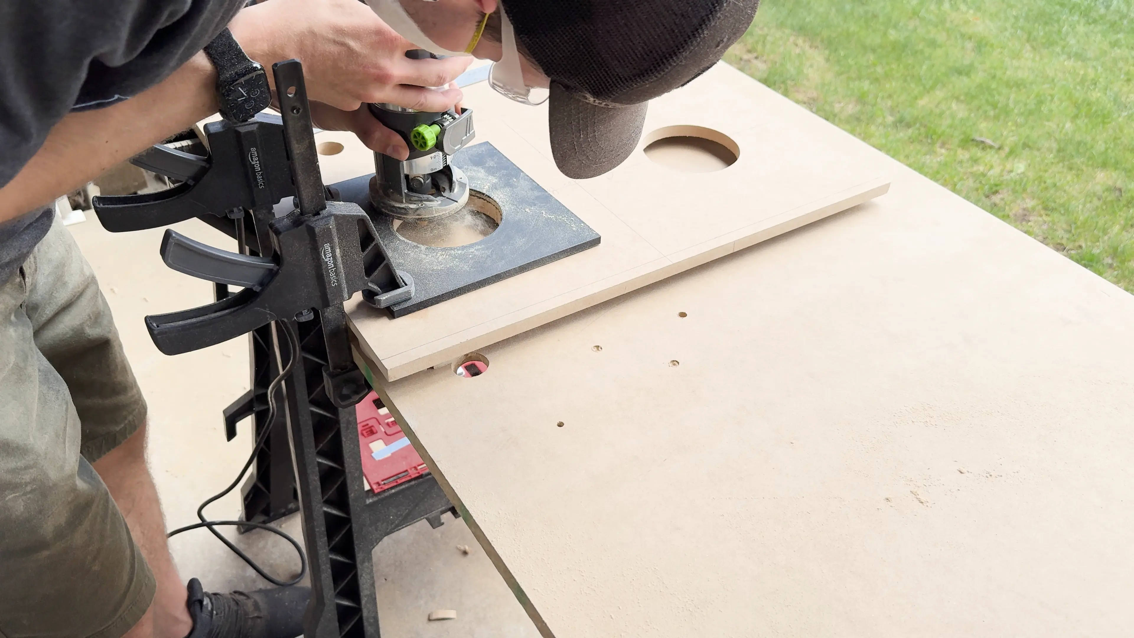 Getting perfect 4 speaker holes using a 3D printed jig and a flush trim bit.