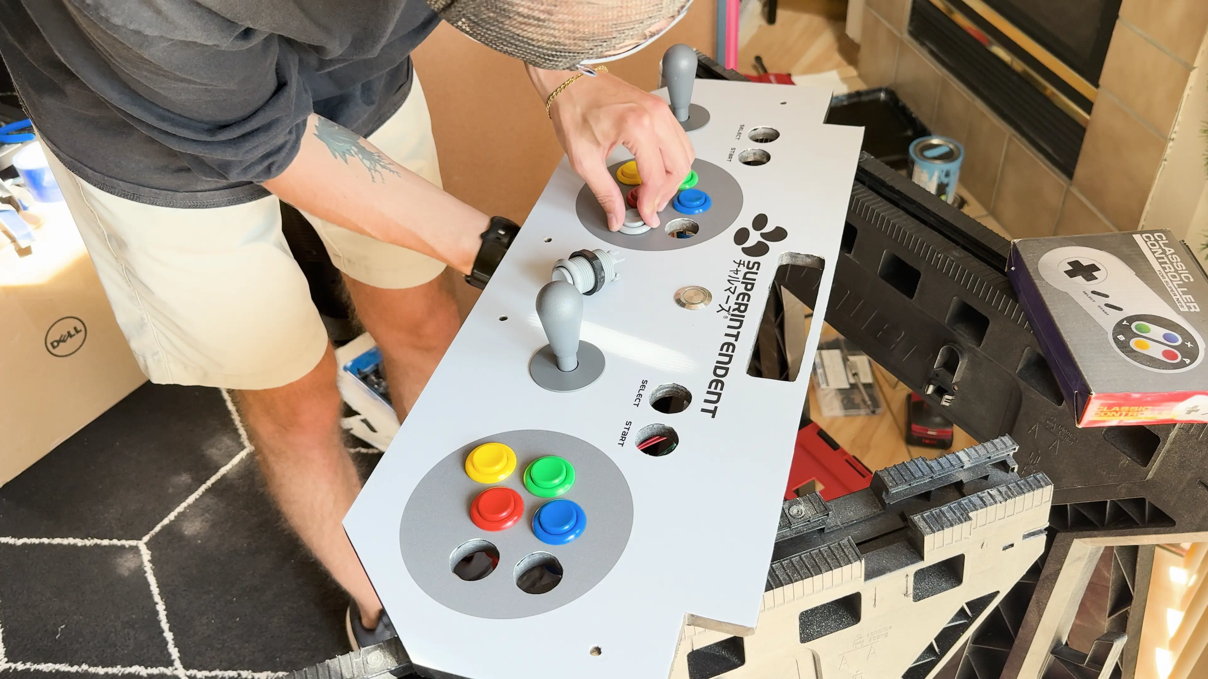 Installing the physical buttons is actually kind of awkward with the joysticks already in place.